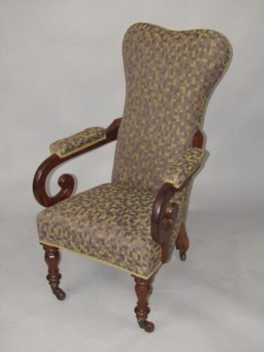 A Victorian mahogany open armchair