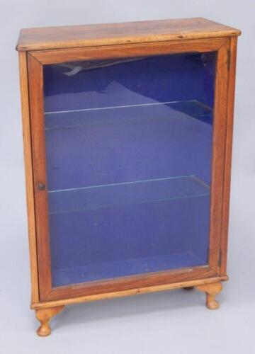 An oak display cabinet