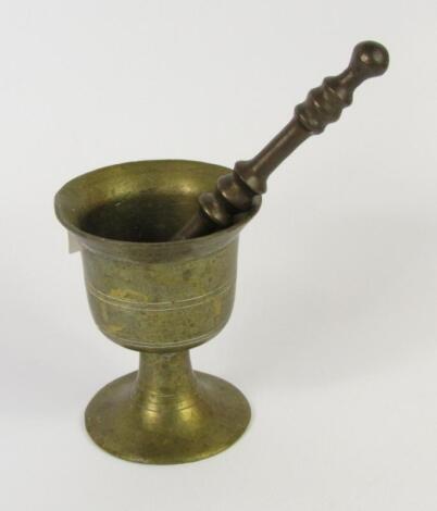 A brass pestle and mortar