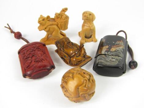 Four Japanese carved wooden netsukes