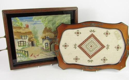 An oak twin handled tray with inset tapestry of a rural hamlet