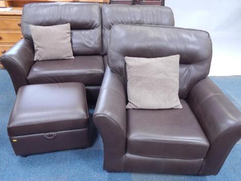 A modern brown leather two seater sofa