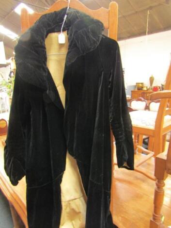 A 1920's ladies black velvet gown