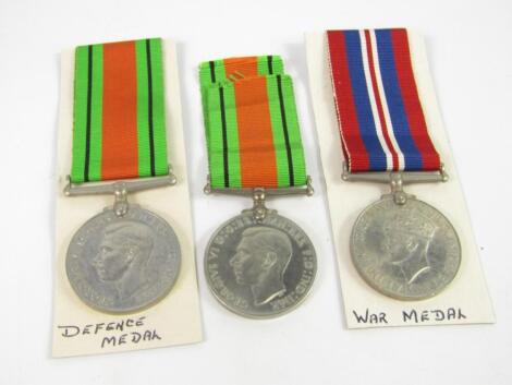 A WWII War medal and two Defence medals.