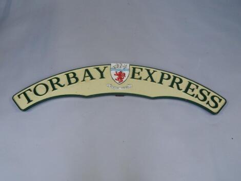 A cast metal and enamel replica train headboard Torbay Express