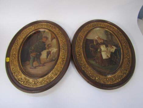 A pair of Goldscheider oval pottery picture plaques