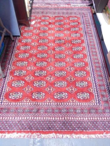 A Shiraz red ground rug