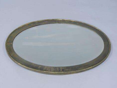 An early 20thC Neo-Classical style oval brass framed wall mirror