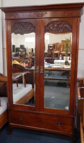 An Art Nouveau mahogany wardrobe