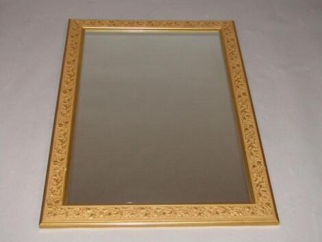 A rectangular gilt wall mirror