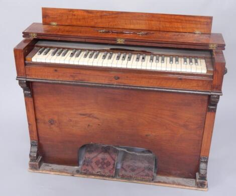 An early 20thC rosewood cased organ by J Claypole & Son