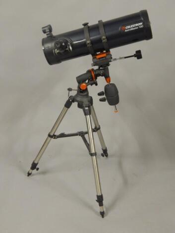 A Celestron Astro Master 130 celestial telescope.