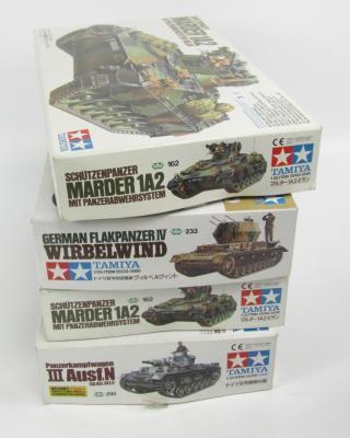 *Four Tamiya model kits