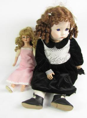 A collection of dolls and doll parts