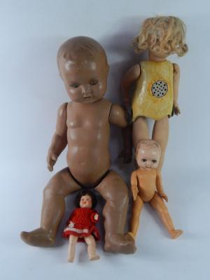 A collection of mid 20thC plastic and composite dolls