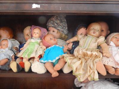 A collection of mid 20thC and later plastic and composite dolls