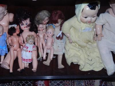 A collection of mid 20thC and later composite and plastic dolls.