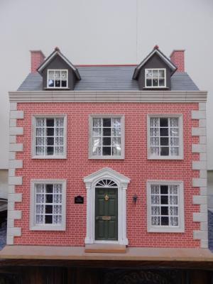 A kit built Georgian style doll's house entitled The Manor