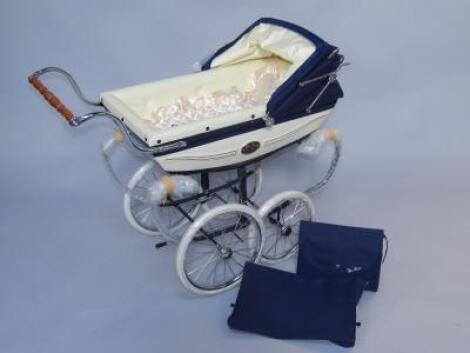 A Silver Cross doll's pram