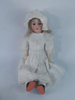 A Max Handwerck bisque head doll