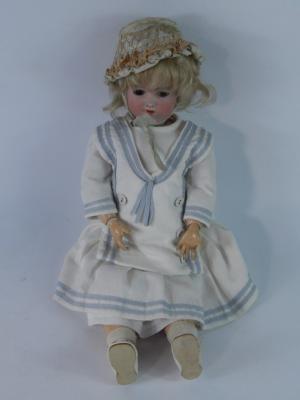 A Simon & Halbig bisque head character baby doll