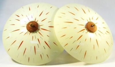 A pair of 1960's cream glass ceiling lights