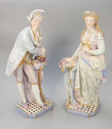 A large pair of late 19thC French Vion & Baury bisque porcelain figures