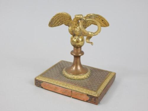 A 19thC French gilt brass and copper desk weight