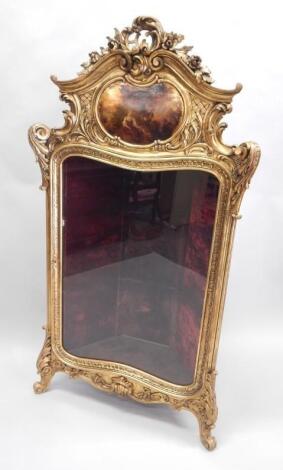 A late 19thC Continental gilt wood corner cabinet