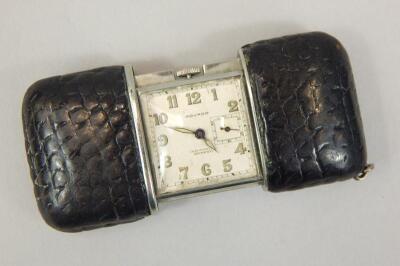 A Movado Ermeto pressed leather wrapped purse watch