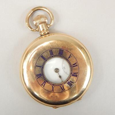 A mid 20thC Moon brand half hunter gold plated pocket watch