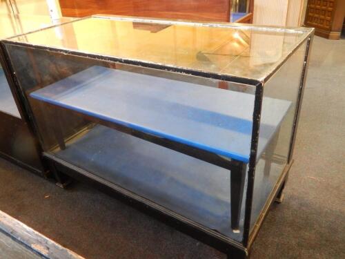 *A 20thC ebonised shop display counter