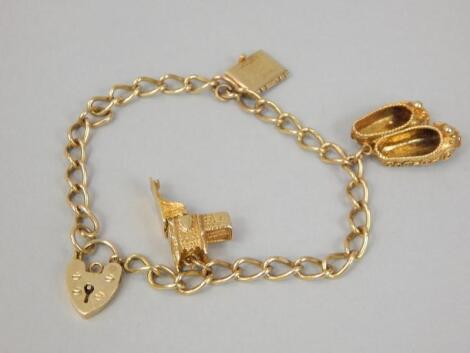 A 9ct gold charm bracelet