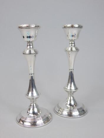 A pair of modern silver candlesticks
