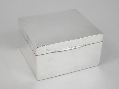 A 20thC rectangular cigarette box