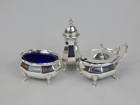 An associated silver three piece cruet