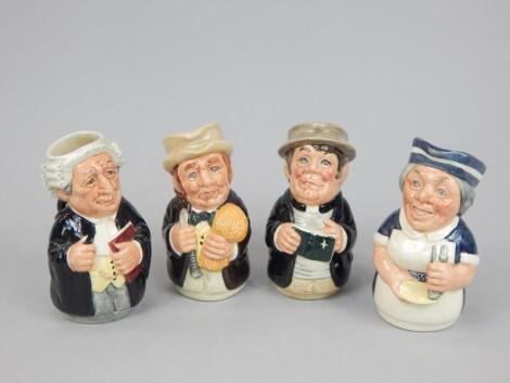 A set of four Royal Doulton character jugs