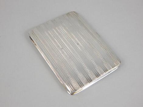 An engine turned Art Deco style small silver cigarette case