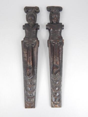 A pair of 17thC oak caryatid carvings of a lady and gentleman