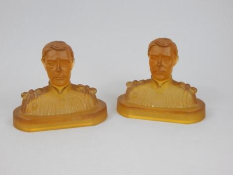 A pair of Davidson type moulded glass busts