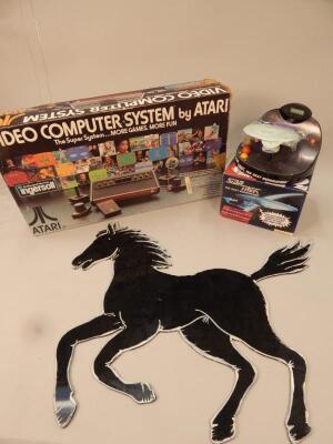 An Atari video computer gaming system