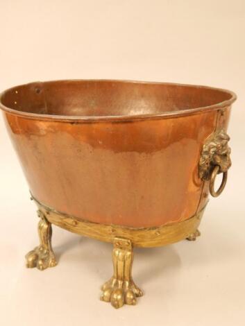 A copper and brass coal bucket