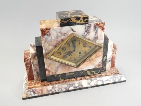 A French Art Deco period variegated marble mantel clock