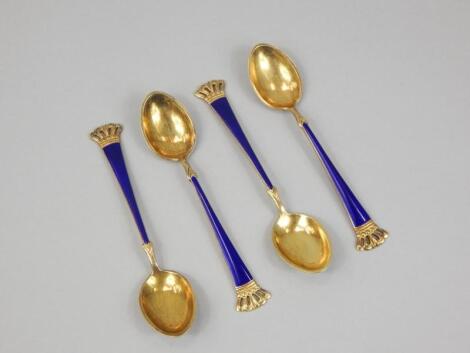 A set of four Norwegian part enamel spoons