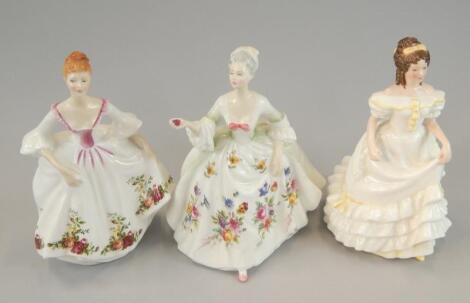 Three Royal Doulton porcelain figures