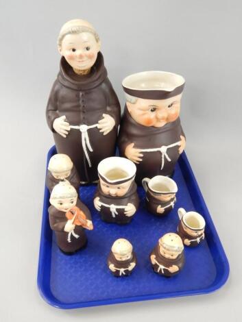 A collection of Goebel ceramic figures of monks