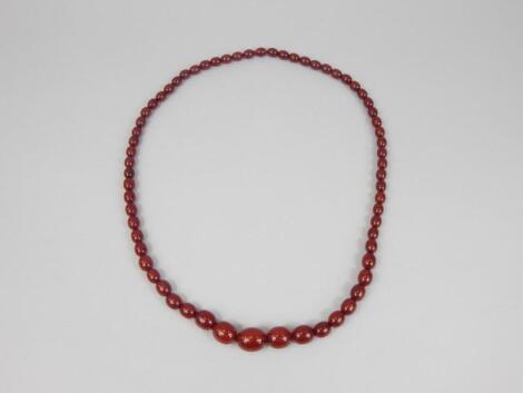 A modern red amber beaded necklace