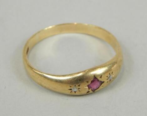 An 18ct gold ruby and diamond dress ring