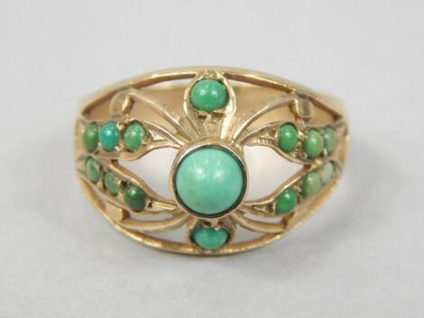 A 9ct gold turquoise set dress ring