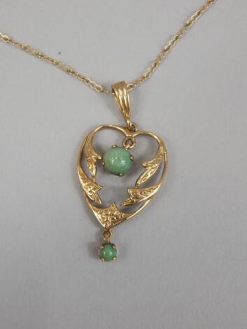 A 9ct gold turquoise set pendant